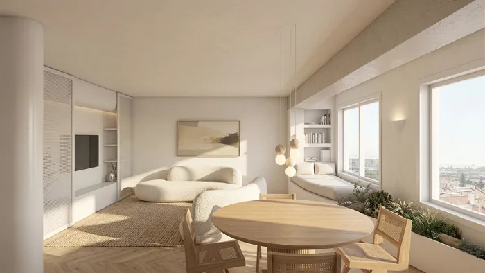 Quarto claro com secretária junto à janela